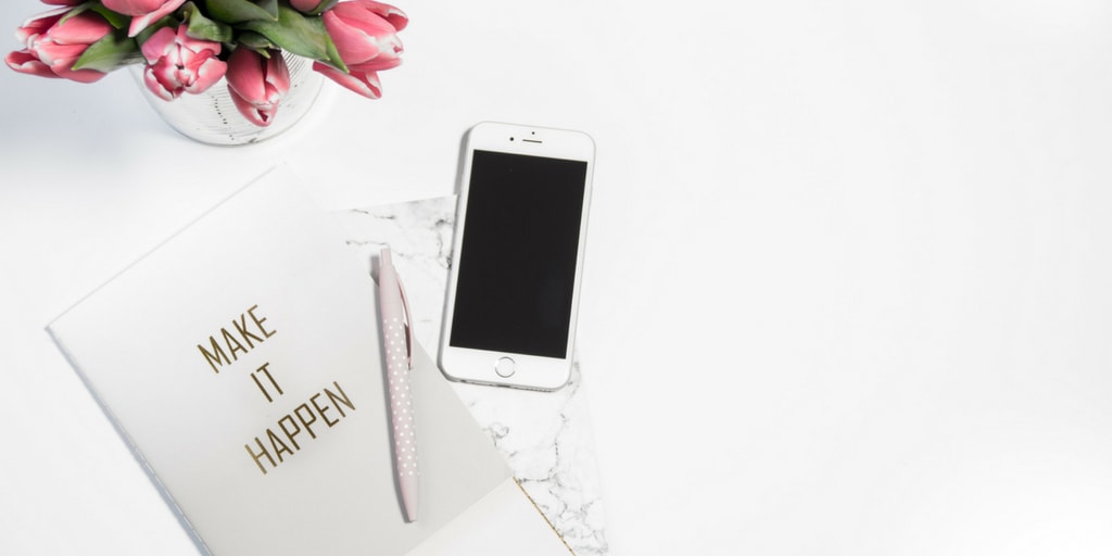 Blogger takeover - notebook and iPhone on a desk